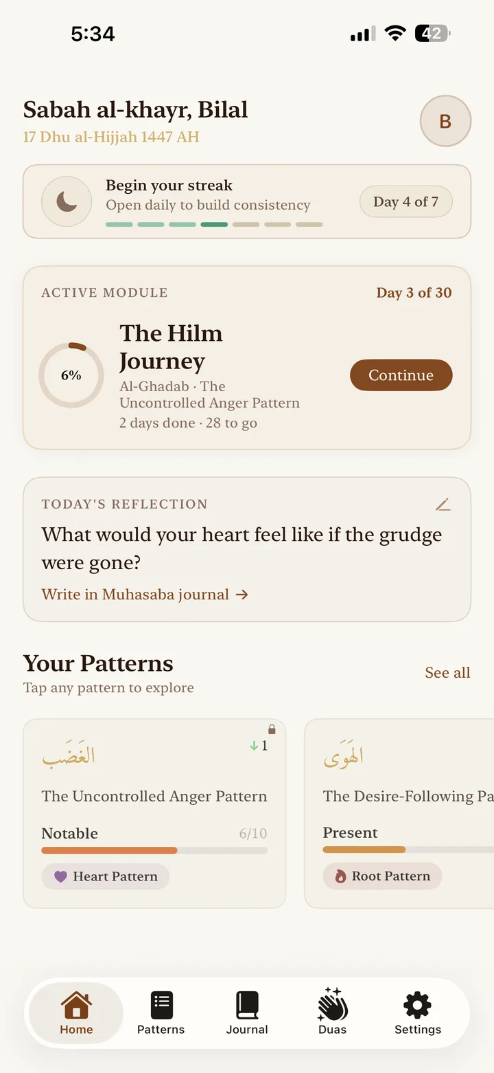 The Qalb home screen on iPhone